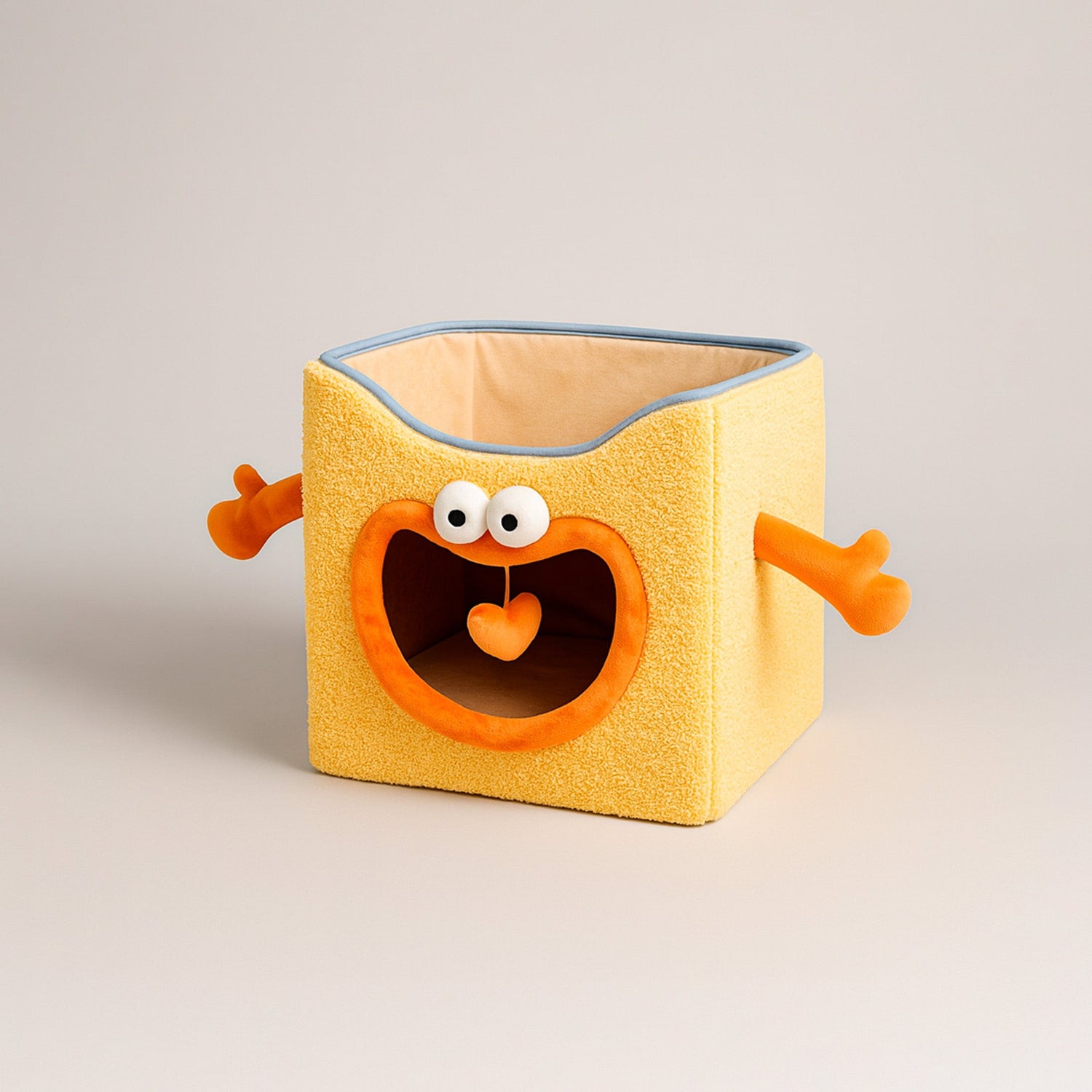 Letto Orange Monster Zeze con design sorridente e braccia elastiche per gatti